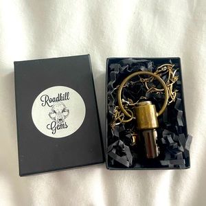 Roadkill Gems Essential Oil Necklace.